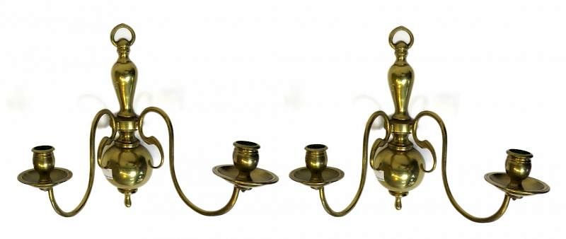 Appraisal: Brass Sconces Brass Sconces Description A pair of solid brass