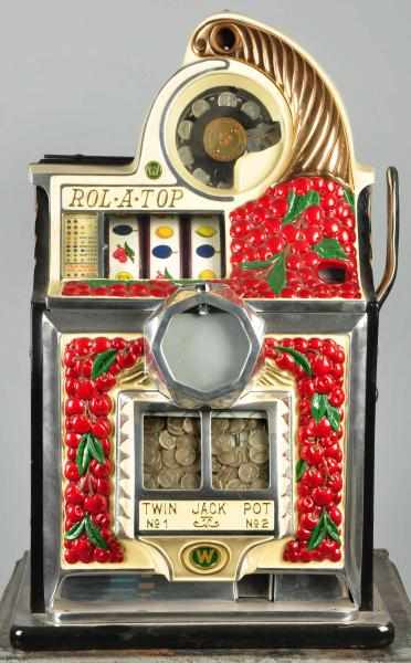 Appraisal: Watling Cherry Front Rol-A-Top Slot Machine Description Working Cherry front