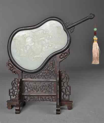 Appraisal: Chinese White Carved Hardstone with StandCarved translucent white hardstone guitar-shaped