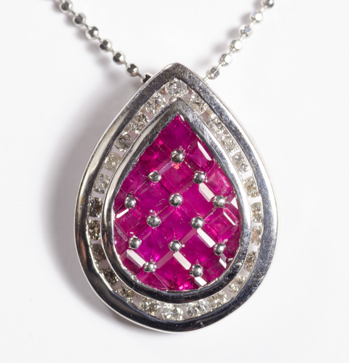 Appraisal: RUBY DIAMOND AND FOURTEEN KARAT WHITE GOLD PENDANT NECKLACE the