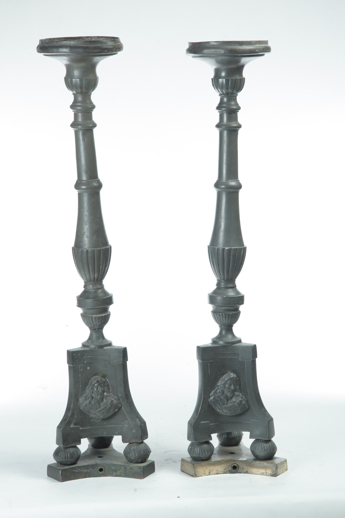 Appraisal: PAIR OF ECCLESIASTICAL CANDLE HOLDERS European late th century Trefoil