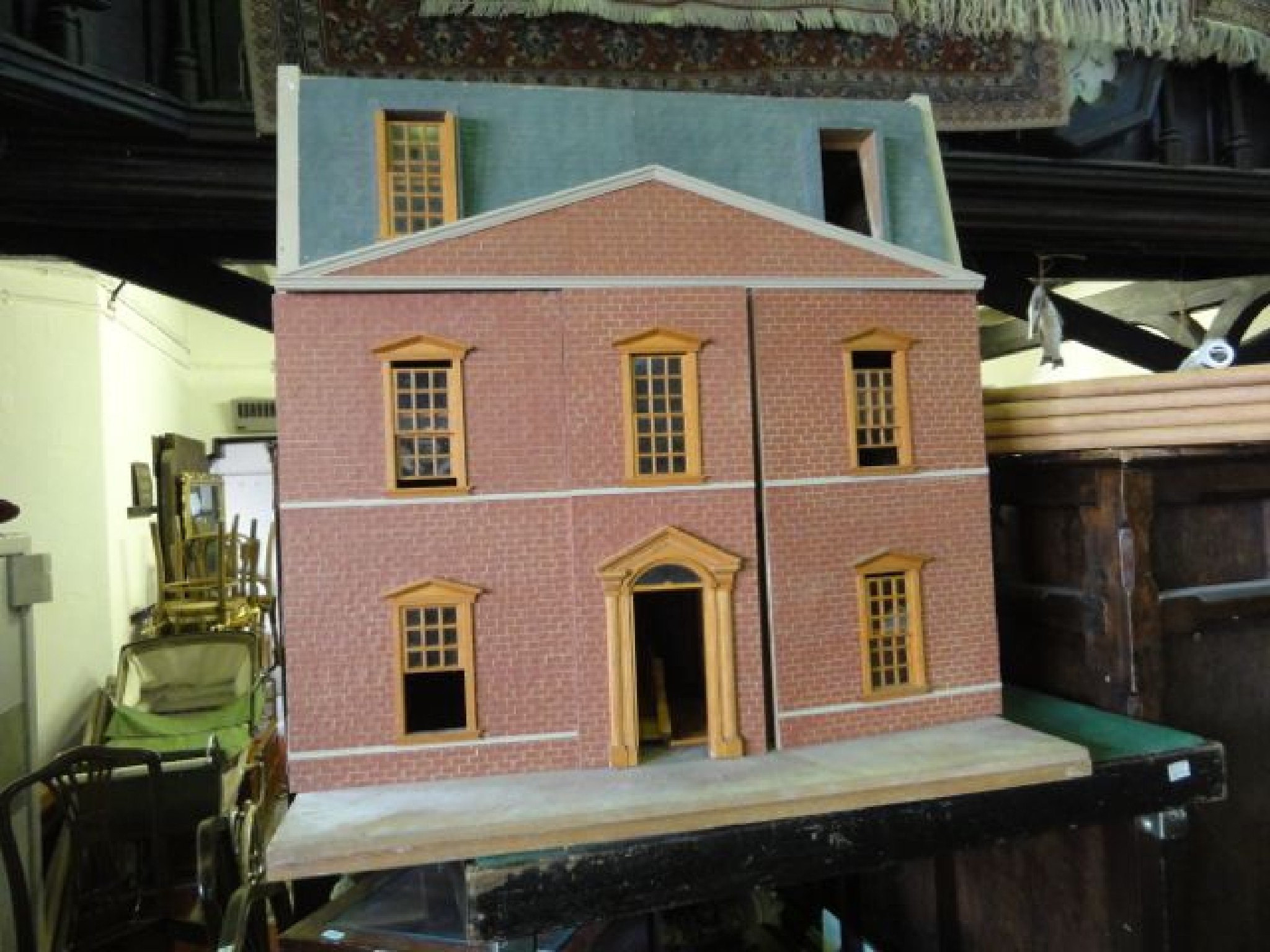 Appraisal: A contemporary dolls house in the mock Georgian style with