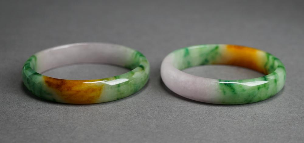 Appraisal: Pair of Mottled Jade Bangle Bracelets L approx