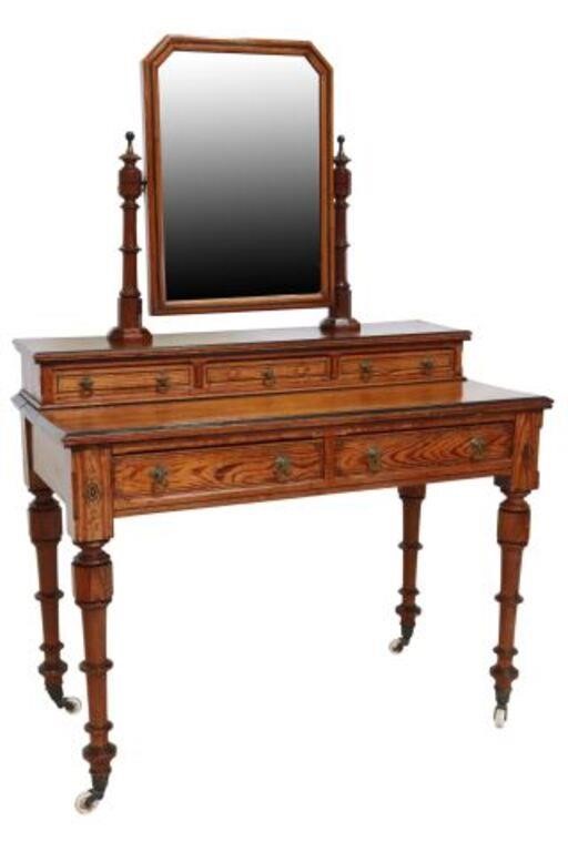 Appraisal: English Victorian pine dressing table th c shaped swivel mirror