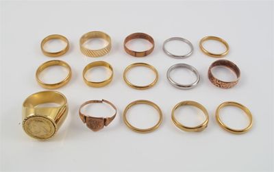 Appraisal: Two platinum rings g And thirteen gold rings g