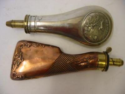 Appraisal: A POWDER FLASK late th century brass mounted copper in