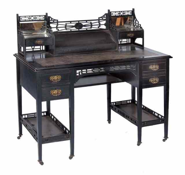 Appraisal: A LATE TH CENTURY EBONISED DESK in the style of