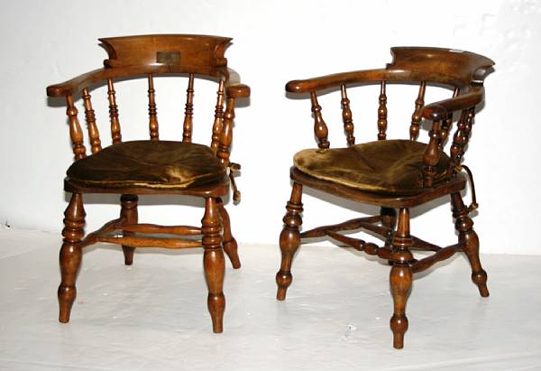 Appraisal: Two English walnut pub chairs mid th century height in