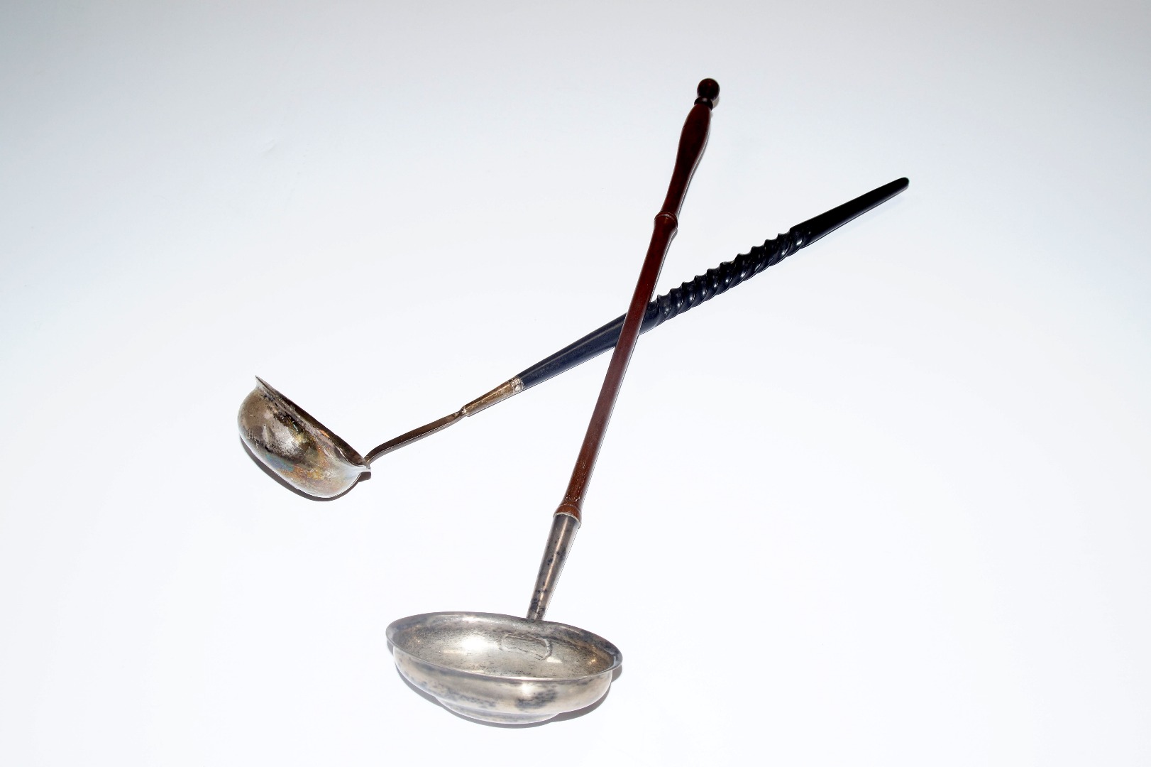 Appraisal: A George III silver toddy ladle with a turned wooden