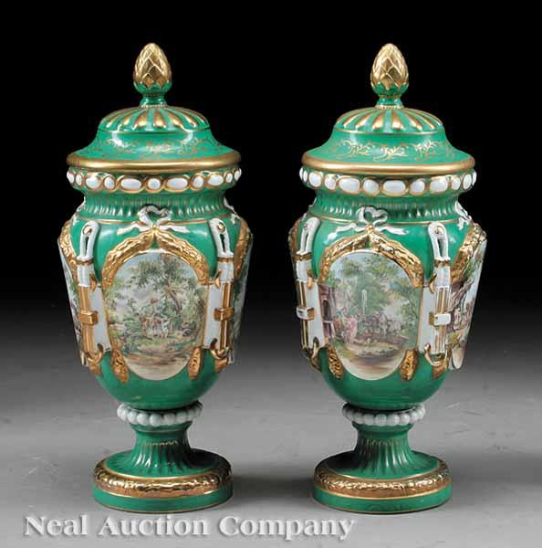 Appraisal: A Pair of Neoclassical-Style Apple Green and Polychromed Porcelain Urns