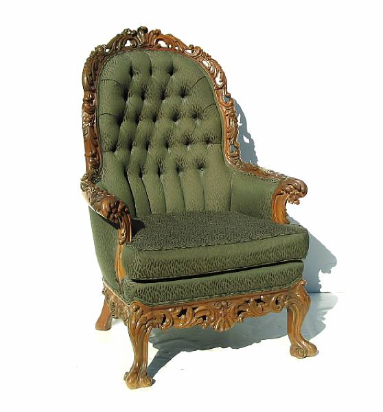 Appraisal: A Renaissance style highly carved walnut armchair th century height