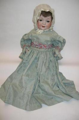 Appraisal: A George Borgfeldt bisque head girl doll with blue glass