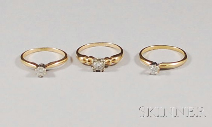 Appraisal: Three Small kt Gold and Diamond Solitaire Rings sizes to