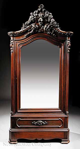 Appraisal: An American Rococo Carved Rosewood Armoire mid- th c attributed