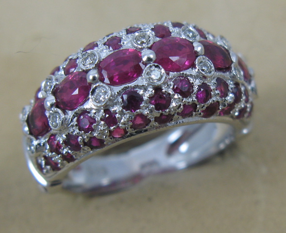 Appraisal: RUBY DIAMOND AND FOURTEEN KARAT GOLD RING set with six