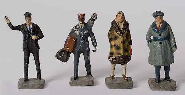 Appraisal: Toy Railroad Figures Japanese four composition toy railroad figures marked