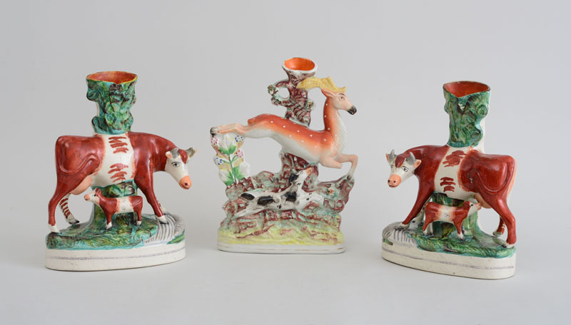 Appraisal: PAIR OF STAFFORDSHIRE COW GROUP VASES AND A RUNNING STAG