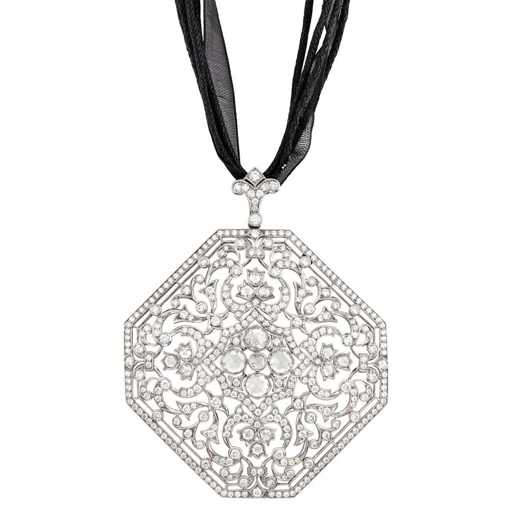 Appraisal: White Gold and Diamond Pendant with Ribbon and Metal Necklace