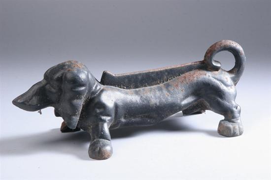 Appraisal: CAST IRON DACHSHUND BOOTSCRAPER th century - in long