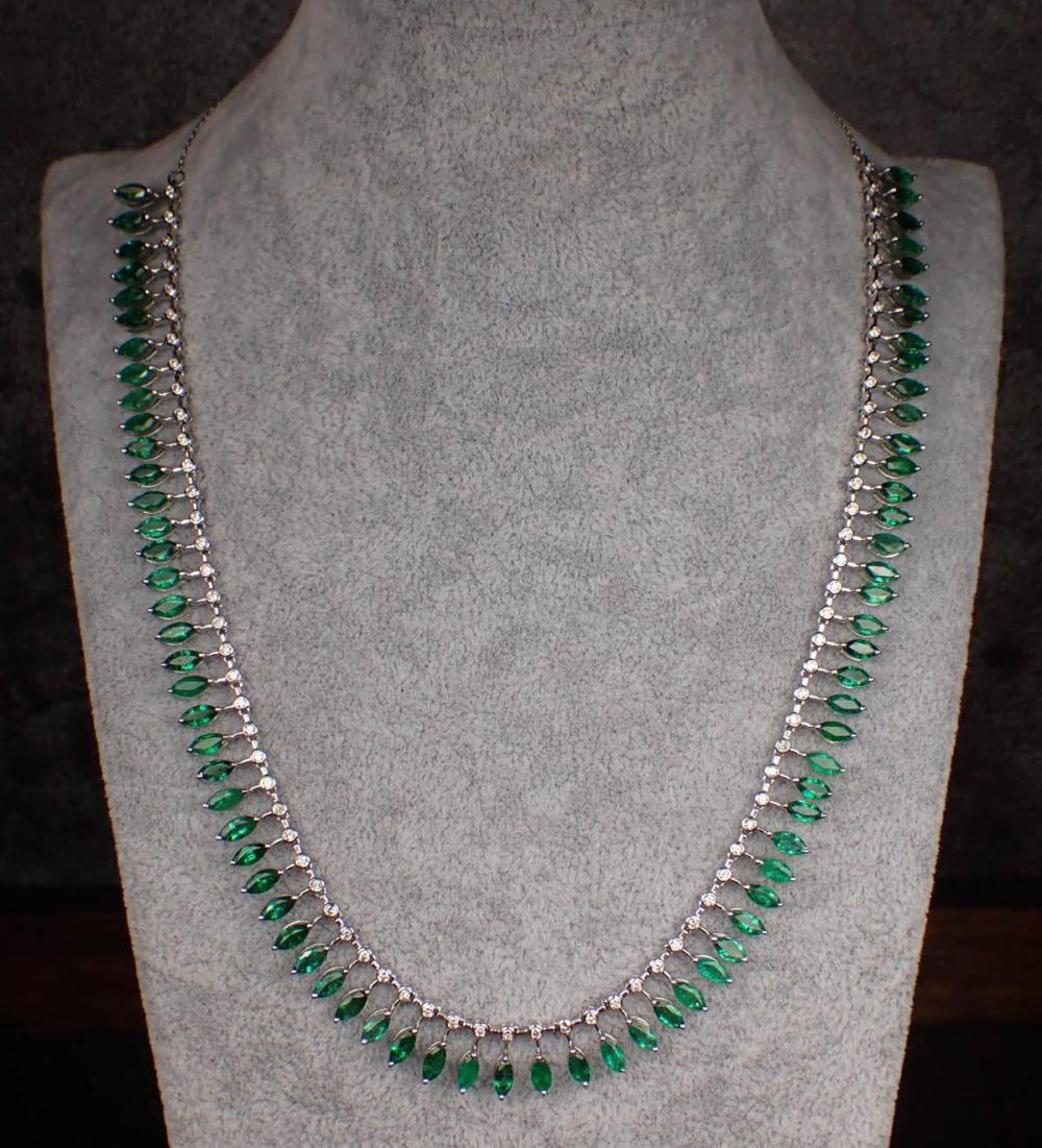 Appraisal: EMERALD DIAMOND AND FOURTEEN KARAT GOLD NECKLACE The white gold