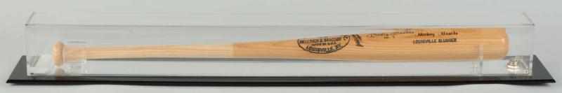 Appraisal: Autographed Mickey Mantle Louisville Slugger Bat Description Signed Mickey Mantle