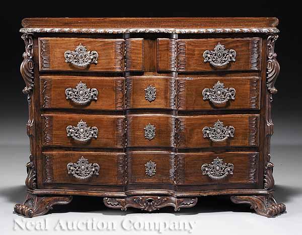 Appraisal: A Portuguese Carved Mahogany Commode th c with silvered bronze