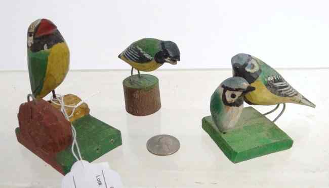 Appraisal: Lot three polychrome painted carved wooden birds '' to ''