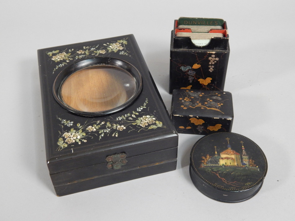 Appraisal: A thC ebonised and painted viewer a set of playing