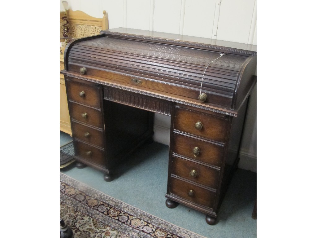 Appraisal: Wylie and Lochhead oak roll top desk