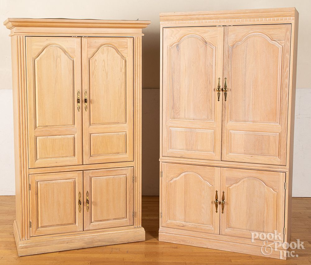 Appraisal: Two oak entertainment cabinets h w Two oak entertainment cabinets