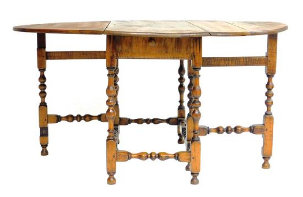 Appraisal: Figured maple gate leg table New England c two demi-lune