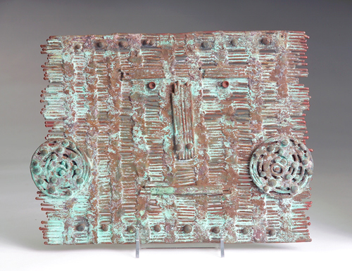 Appraisal: KLAUS IHLENFELD Hanging wall sculpture Chimu-Mask in copper and bronze