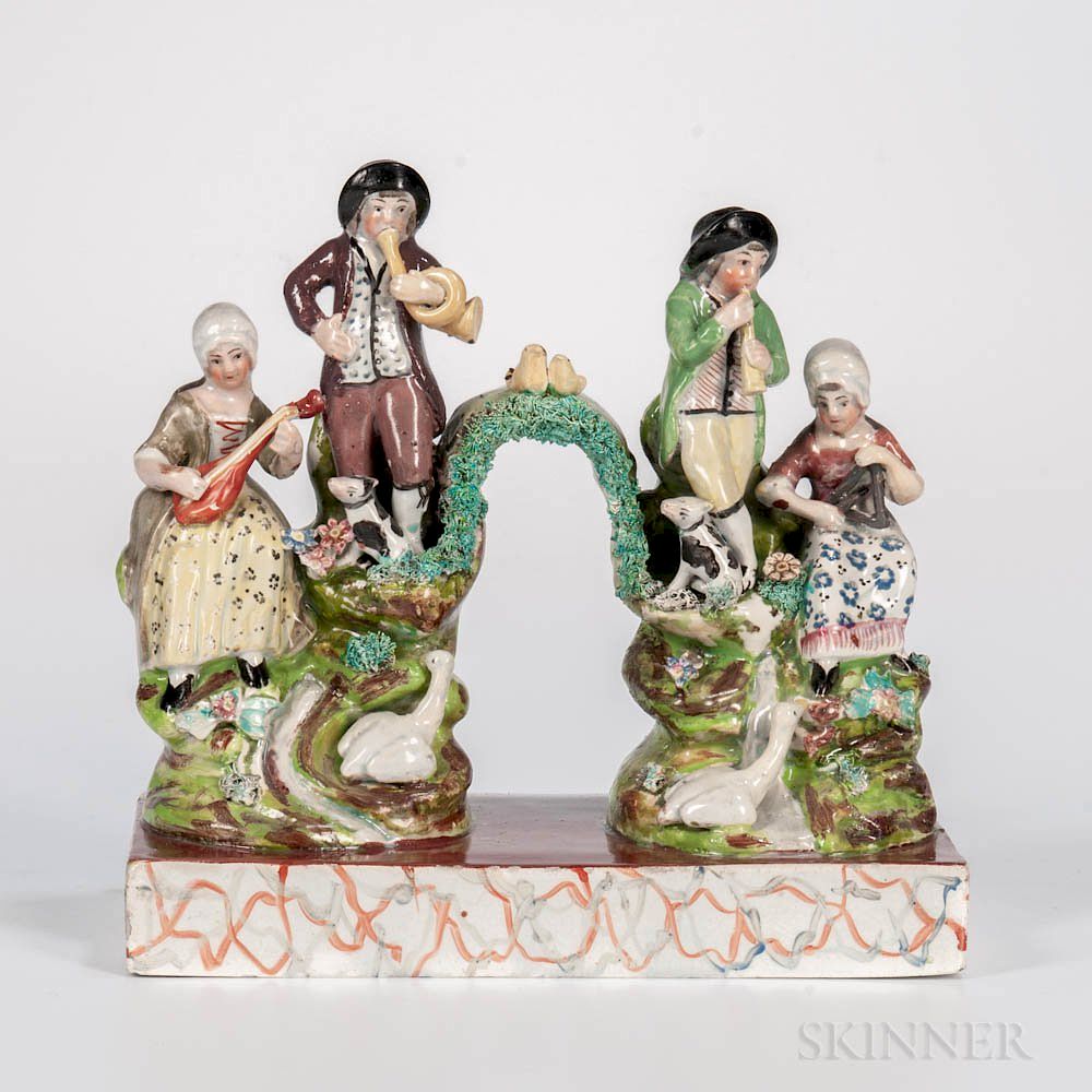 Appraisal: Staffordshire Earthenware Musicians Group Staffordshire Earthenware Musicians Group England c