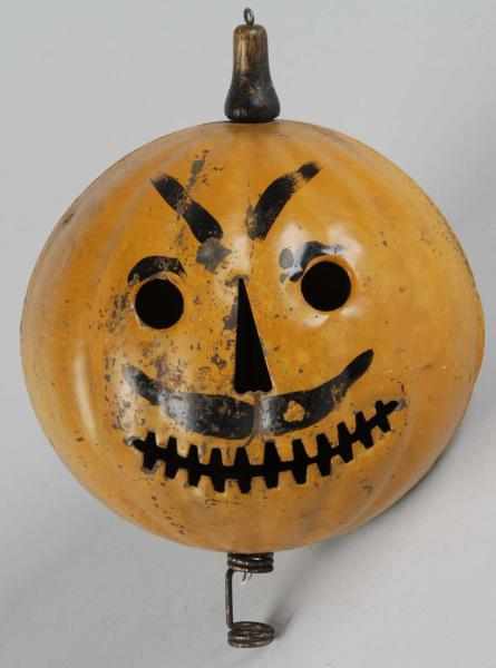 Appraisal: Tin Halloween Pumpkin Head Parade Lantern Description Minor scuffs and