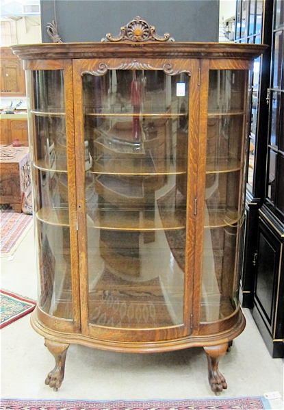 Appraisal: LATE VICTORIAN OAK AND CURVED GLASS CHINA CABINET American c