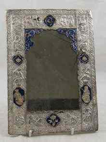 Appraisal: A white metal tests silver and enamel Persian mirror with