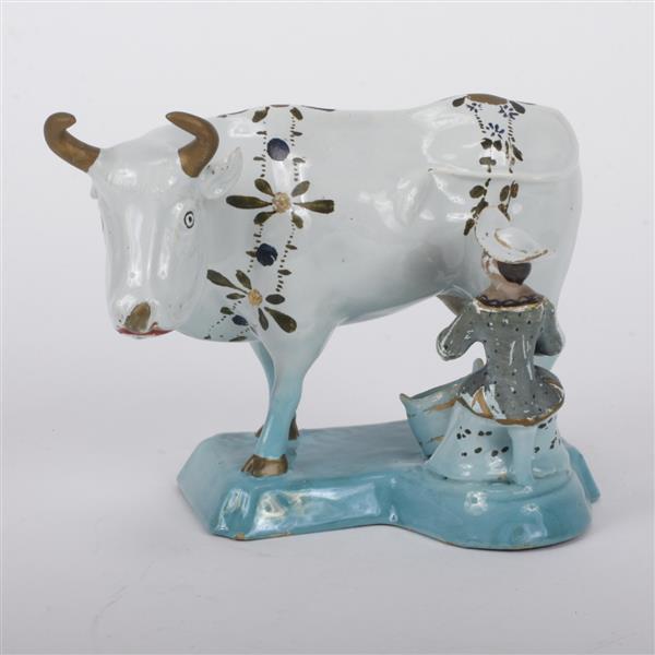 Appraisal: English Staffordshire figural group with milk maid English Staffordshire figural