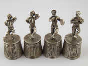 Appraisal: A set of four silver vodka cups in the form