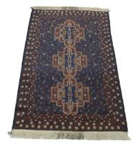 Appraisal: A Baluch Carpet late th Century Area rug features three