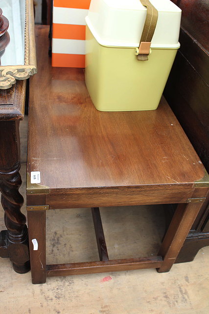 Appraisal: A HARDWOOD LOW RECTANGULAR COFFEE TABLE with brass bound corners