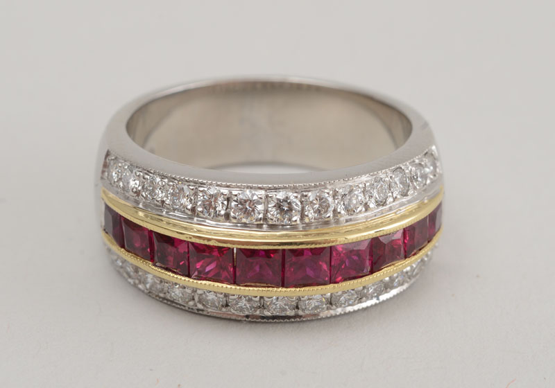 Appraisal: PLATINUM DIAMOND AND RUBY RING Stamped 'PLAT' 'KD' channel set