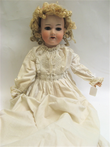 Appraisal: ARMAND MARSEILLES BISQUE HEAD GIRL DOLL H blond curly wig