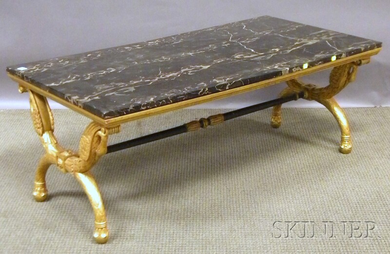 Appraisal: Empire-style Black Marble-top Carved Giltwood Coffee Table the rectangular marble