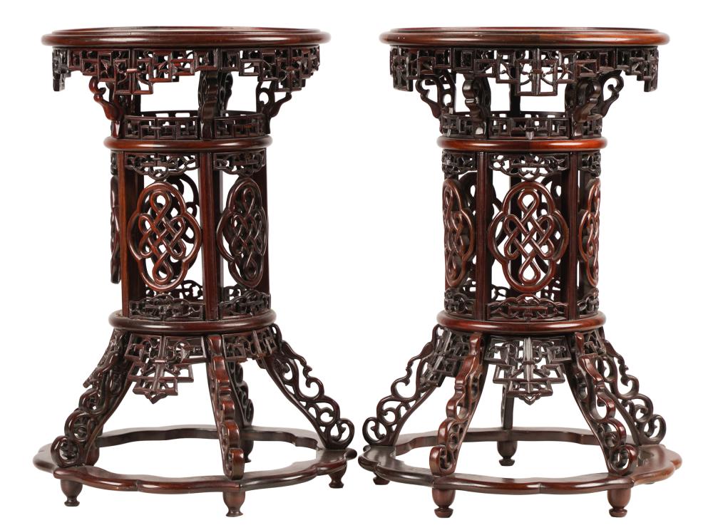 Appraisal: PAIR OF CHINESE HARDWOOD STANDSCondition repair and missing fretwork throughout