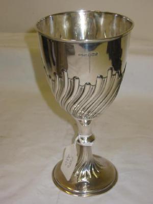 Appraisal: A VICTORIAN GOBLET the ovoid bowl with embossed spiral fluting