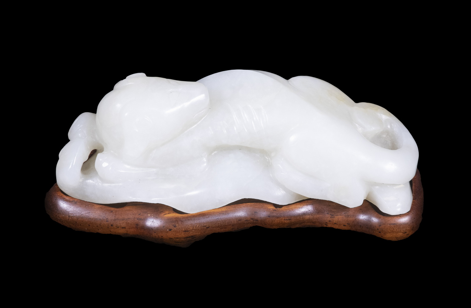 Appraisal: CHINESE CARVED JADE LIONESS OR LEOPARD ON STAND th c