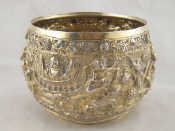 Appraisal: A gilt metal tests silver bowl heavily decorated with raised