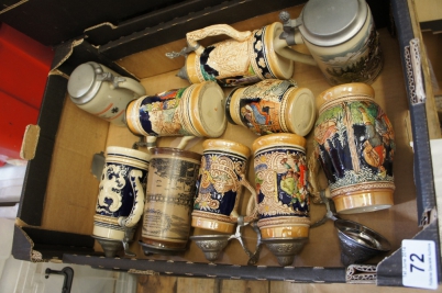 Appraisal: A Collection of Various German Embossed Porcelain Beer Steins with