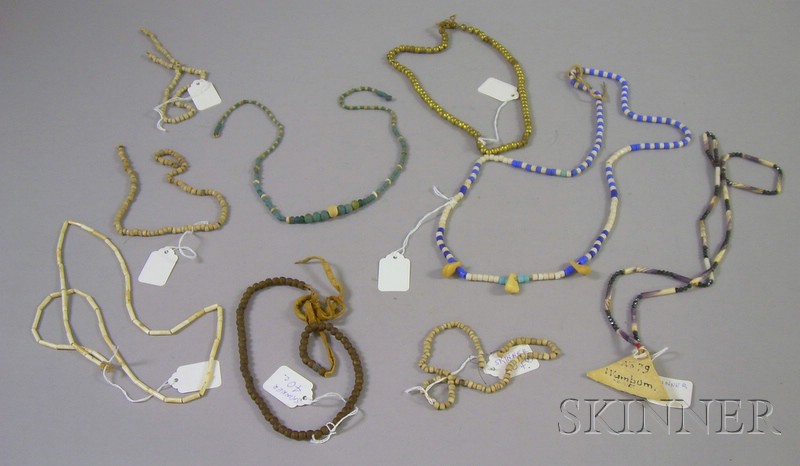 Appraisal: Nine Strands of Beads bone brass and colored beads