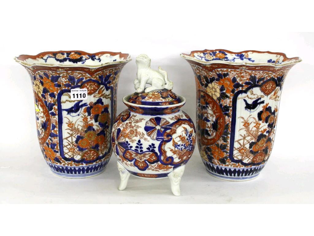 Appraisal: Pair of Japanese Imari flaring fluted vases painted in typical